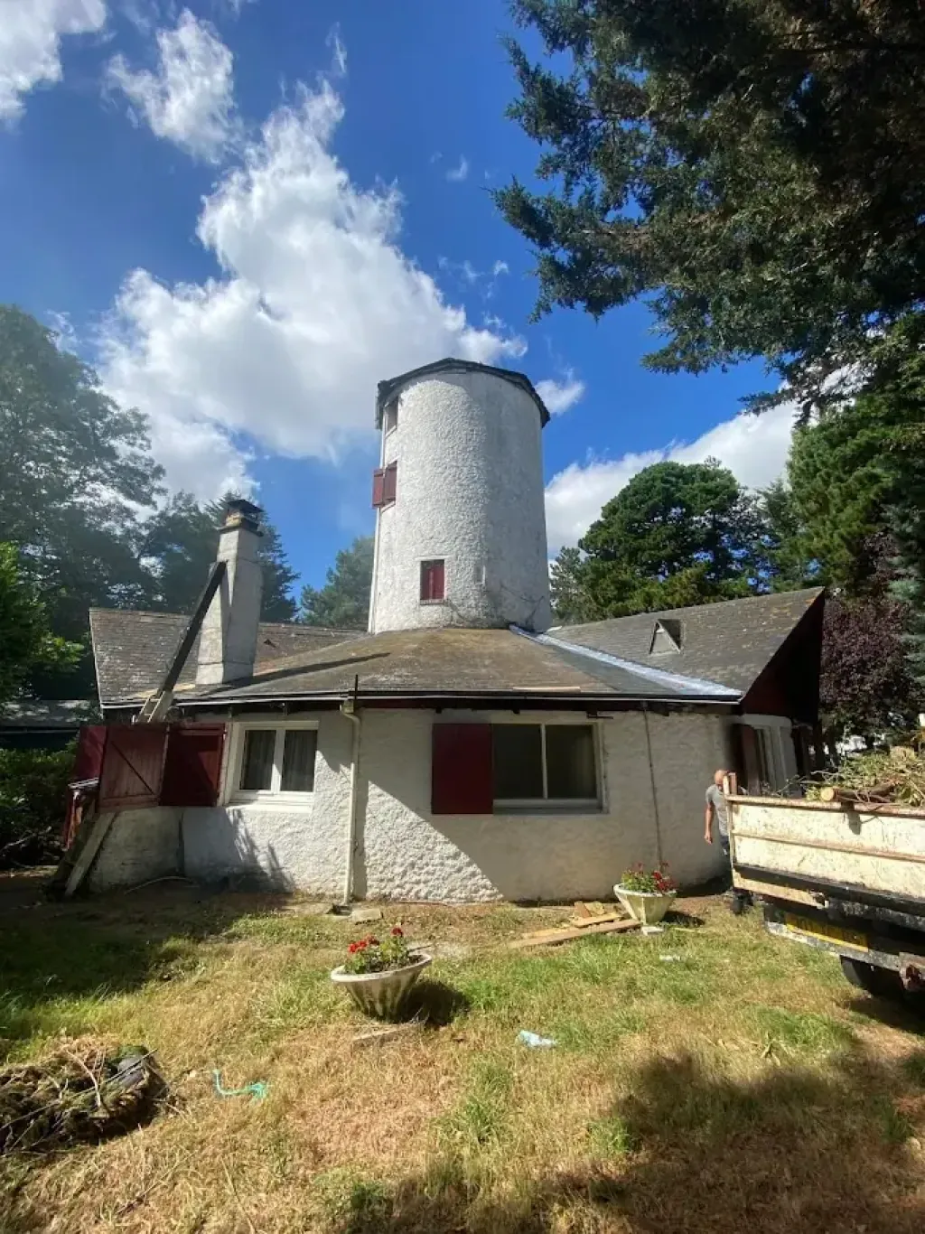 Rénovation d un moulin en ardoise Fibro sur la mesanger en tuile ciment noir